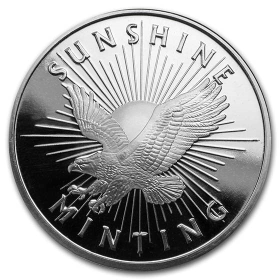 Silver coin with an eagle design and 'Sunshine Minting' text on a white background