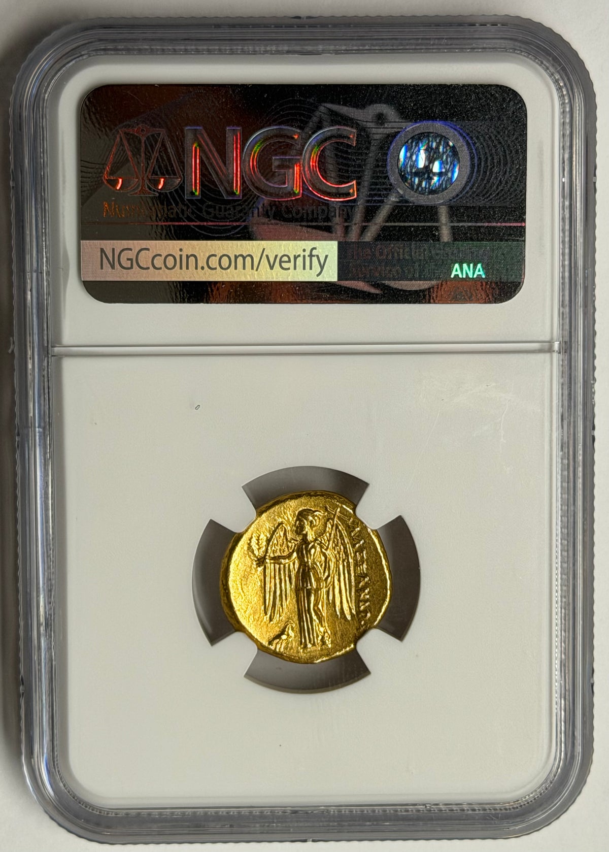 Gold coin in a protective case with NGC grading label